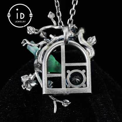 Green Bird Pendant Necklace at Window | Hand-Carved Silver Floral Bird Jewelry | Whimsical Springtime Gift for Nature Lovers and Dreamers