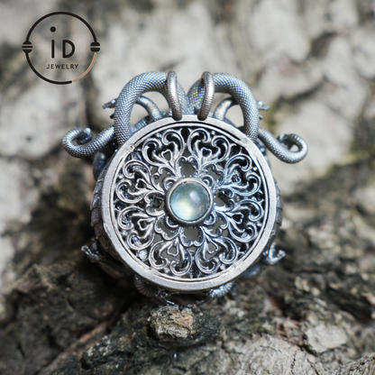 Sleeping Eye Pendant, Silver Medusa Jewelry, Closed-Eye Goddess Amulet with Quartz and Emerald