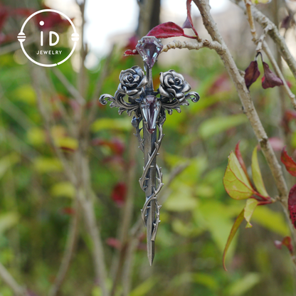 Handcrafted alexandrite pendant with rose and dagger details in oxidized silver – a symbolic talisman in gothic and witchcore style