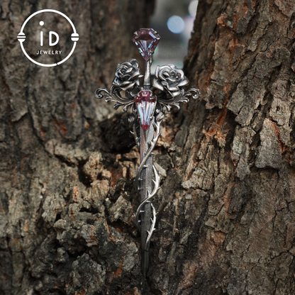Handcrafted alexandrite pendant with rose and dagger details in oxidized silver – a symbolic talisman in gothic and witchcore style