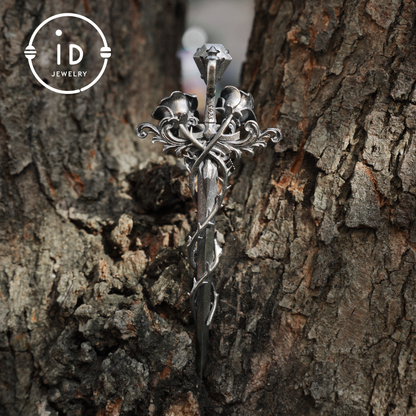 Handcrafted alexandrite pendant with rose and dagger details in oxidized silver – a symbolic talisman in gothic and witchcore style