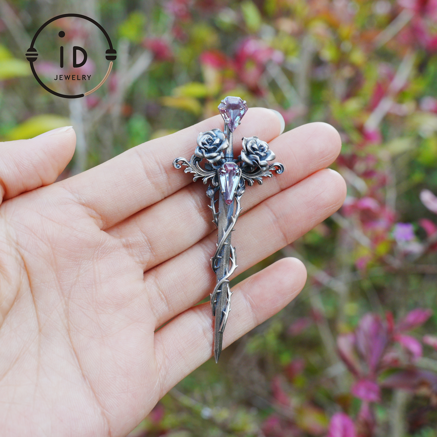 Handcrafted alexandrite pendant with rose and dagger details in oxidized silver – a symbolic talisman in gothic and witchcore style