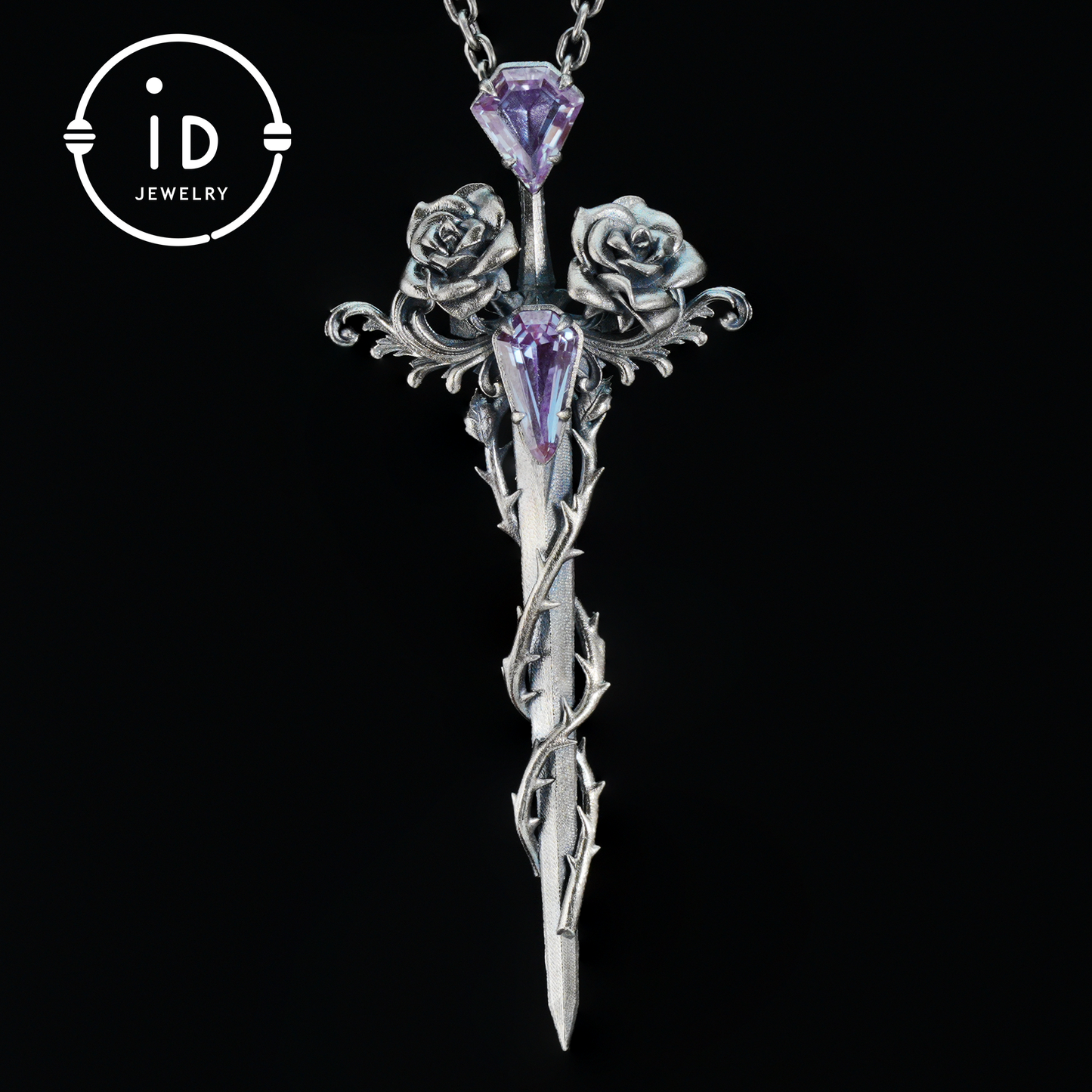 Handcrafted alexandrite pendant with rose and dagger details in oxidized silver – a symbolic talisman in gothic and witchcore style