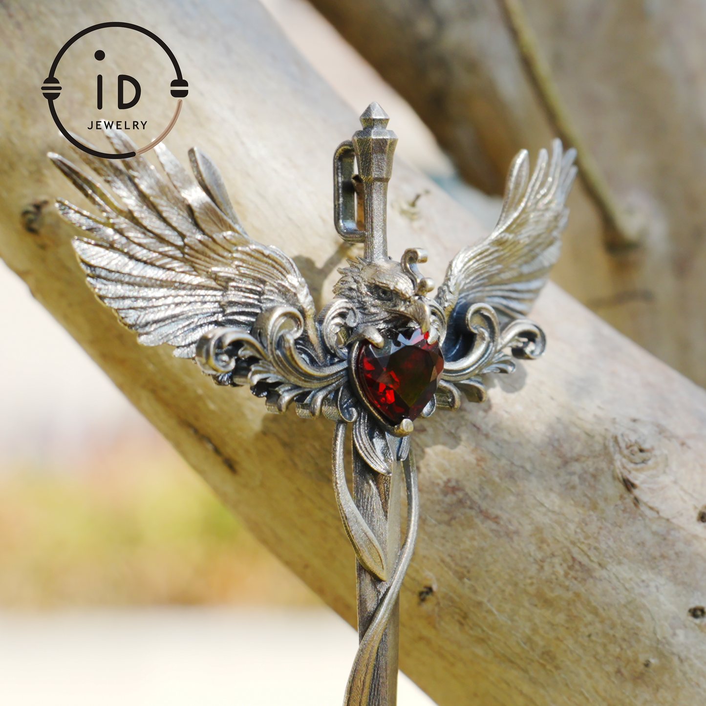 Gothic pendant with winged sword and heart-shaped garnet in oxidized 925 sterling silver, fantasy gift idea for her or cosplay events