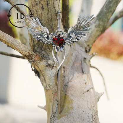 Gothic pendant with winged sword and heart-shaped garnet in oxidized 925 sterling silver, fantasy gift idea for her or cosplay events