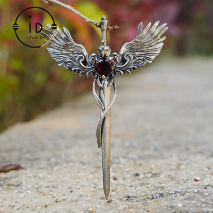 Gothic pendant with winged sword and heart-shaped garnet in oxidized 925 sterling silver, fantasy gift idea for her or cosplay events