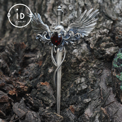 Gothic pendant with winged sword and heart-shaped garnet in oxidized 925 sterling silver, fantasy gift idea for her or cosplay events