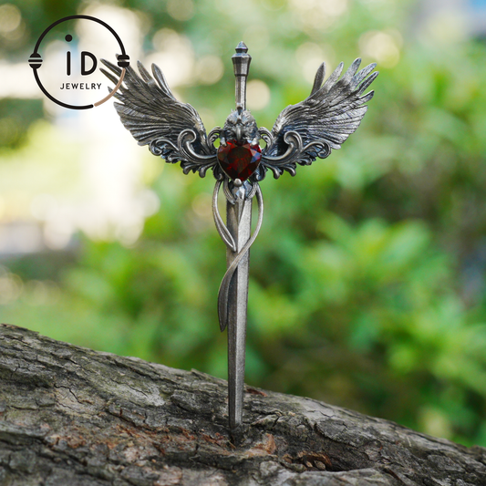 Gothic pendant with winged sword and heart-shaped garnet in oxidized 925 sterling silver, fantasy gift idea for her or cosplay events