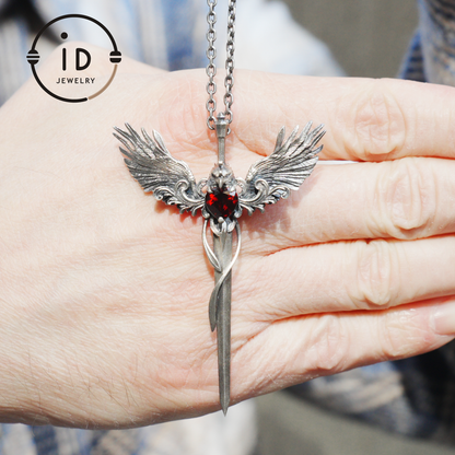 Gothic pendant with winged sword and heart-shaped garnet in oxidized 925 sterling silver, fantasy gift idea for her or cosplay events