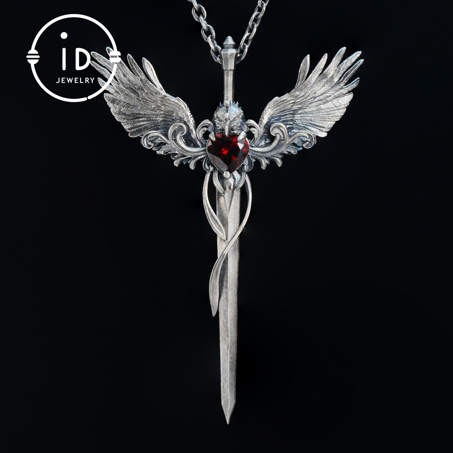 Gothic pendant with winged sword and heart-shaped garnet in oxidized 925 sterling silver, fantasy gift idea for her or cosplay events