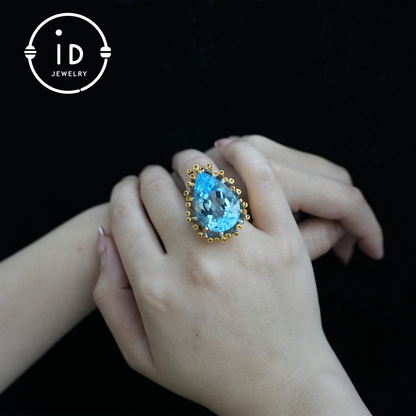Handmade blue topaz ring| unique teardrop gemstone| vintage silver ring with gold accents| boho jewelry| statement gemstone ring